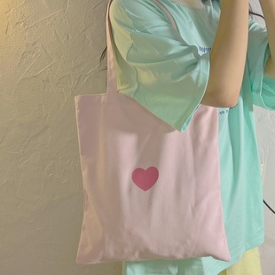日系甜酷爱心粉色单肩包女夏款帆布包包夏季学生补课手提袋拎书袋